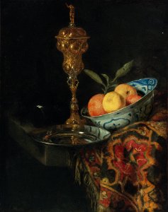 Christiaen Striep - Een stilleven met een schaal van sinaasappelen, een tinnen bord en een vergulde beker