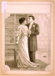 Couple embracing in library LCCN2014636839
