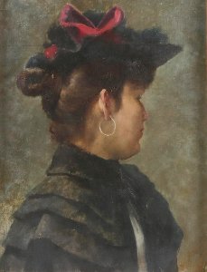 Dame in Schwarz mit roter Masche ca1900