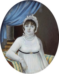 Anonymous A woman sitting in an armchair