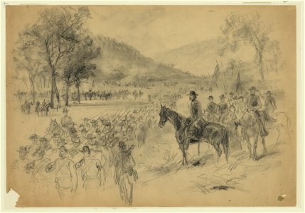 A general and his staff reviewing troops in the field LCCN2004660300