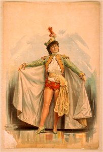 Asian woman in shorts, cape, and feathered hat LCCN2014636852