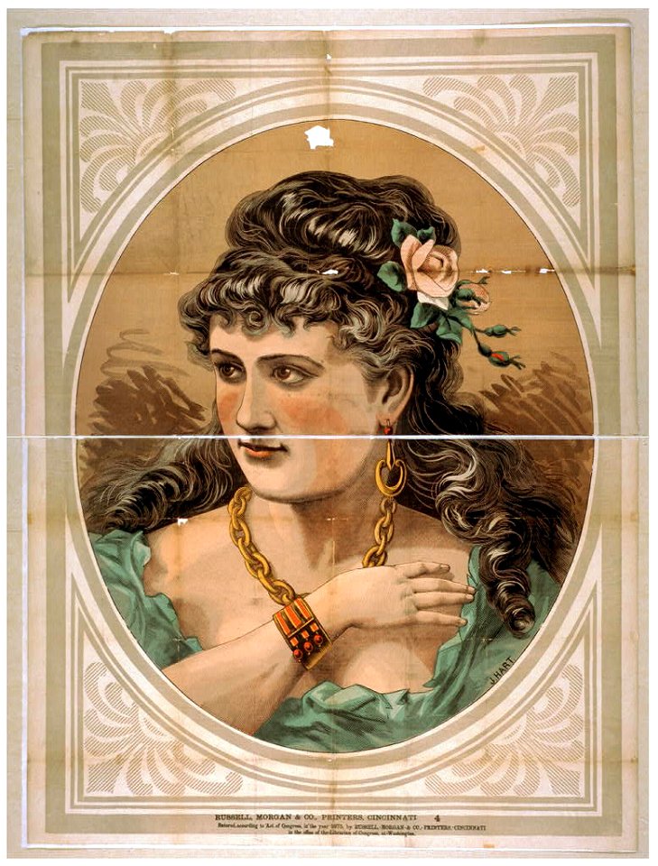 Bust view of woman, wearing rose in hair and green dress LCCN2014637340