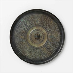 Mirror with stylized bird-dragon motifs