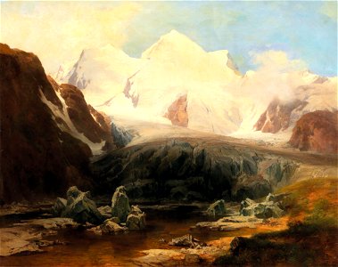 Anton Hansch - A view of a mountain lake with snow-capped mountains in the background