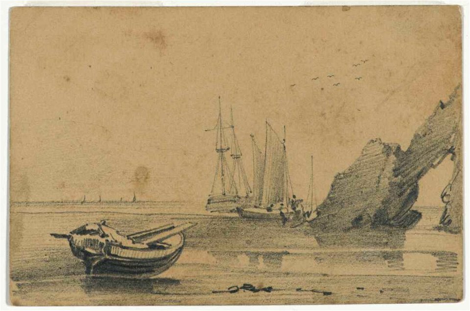 Boats at low tide by a pierced rock A-147-014