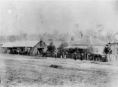 Early streetscape of Brisbane Terrace, Goodna, showing the transport and residents of the area, ca. 1870