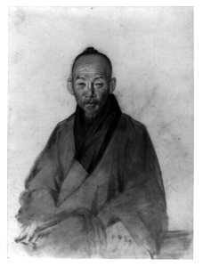 Elderly Chinese man, possibly a scholar, three-quarter length portrait, seated, facing front, holding pipe in right hand; includes Chinese language characters on back LCCN2011660679