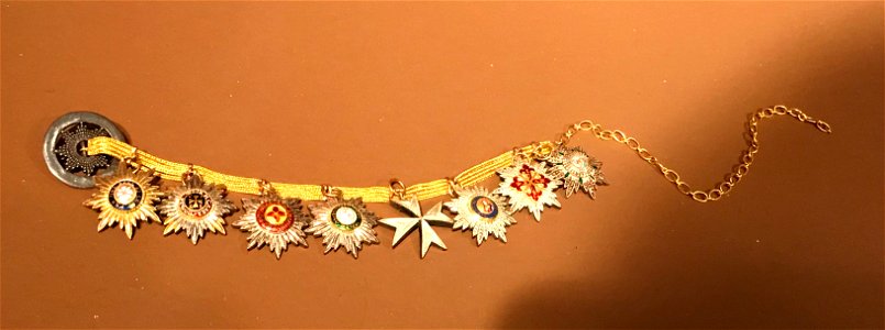 Enamel miniature orders on a gold chain