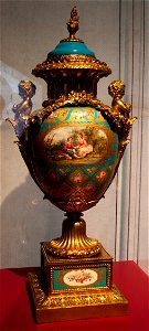Gilded and painted Sevres porcelain vase with bronze adornments