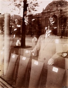 Eugène Atget - Magasin, Avenue des Gobelins - Google Art Project. Free illustration for personal and commercial use.