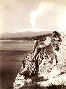 Gloeden, Wilhelm von (1856-1931) - n. 1375 - Young male posed on cliff