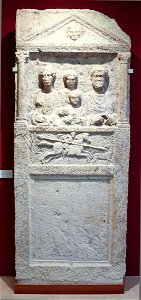 Family tombstone with the representation of a stag hunter
