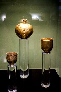 Golden bottle and goblets