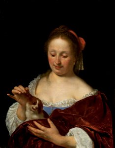 Frans van Mieris (I) - A Woman Pulling a Dog's Ear (Portrait of the Artist's Wife, Cunera van der Cock). Free illustration for personal and commercial use.