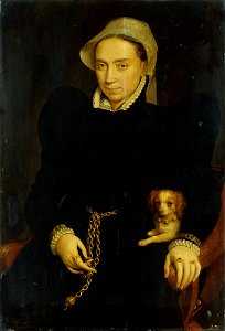 Frans Pourbus the Elder - Portrait of a woman seated in an armchair with a lapdog