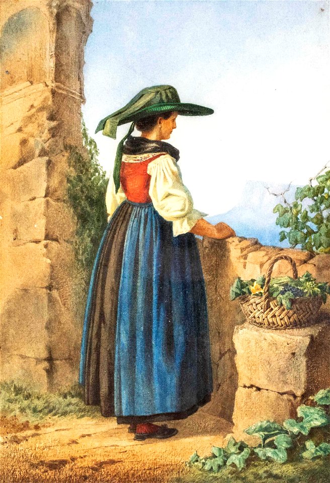 Frau in Tracht blickt von einer Ruine in ein Tal