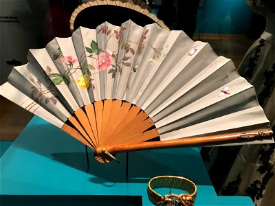 Hand fan with mother-of-pearl insects by Gebrüder Rodeck, Vienna. Free illustration for personal and commercial use.