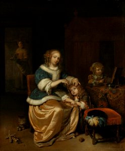 Interieur met een moeder die het haar van haar kind kamt, bekend als ‘Moederzorg’ Rijksmuseum SK-A-293. Free illustration for personal and commercial use.
