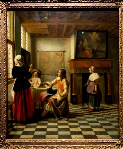 A Woman Drinking with Two Men