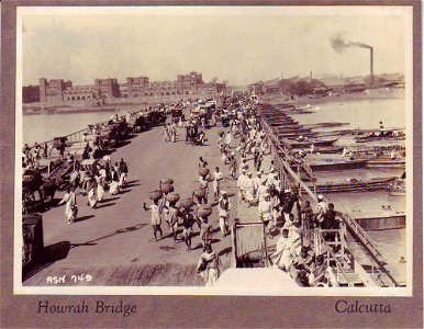 Howrah Bridge, Calcutta - a photo from c. the 1920's. Free illustration for personal and commercial use.