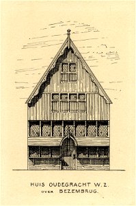 HUA-202591-Opstand van de gereconstrueerde houten voorgevel van een huis aan de Oudegracht tegenover de Bezembrug te Utrecht