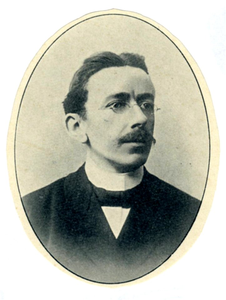 HUA-32116-Portret van J de Vries hoogleraar in de wis en natuurkunde aan de Utrechtse universiteit Borstbeeld van voren in ovaal