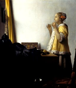 Jan Vermeer van Delft - Young Woman with a Pearl Necklace - Google Art Project. Free illustration for personal and commercial use.