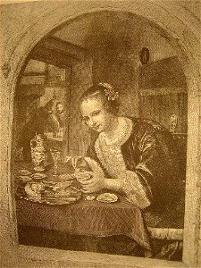Jeune femme mangeant des huîtres