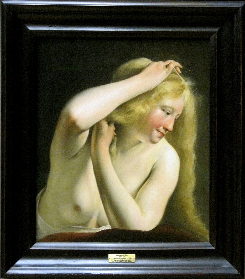 Jeune femme vue en buste se peignant - Salomon de Bray - Louvre