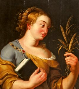 Junge Frau mit Kornähren und Buch