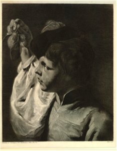 Marco Pitteri - A boy seen head and shoulders holding up a pear with several leaves attached, 1872,0113.14