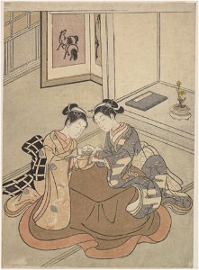 Mma two young women seated by a kotatsu playing cats cradle 55802. Free illustration for personal and commercial use.