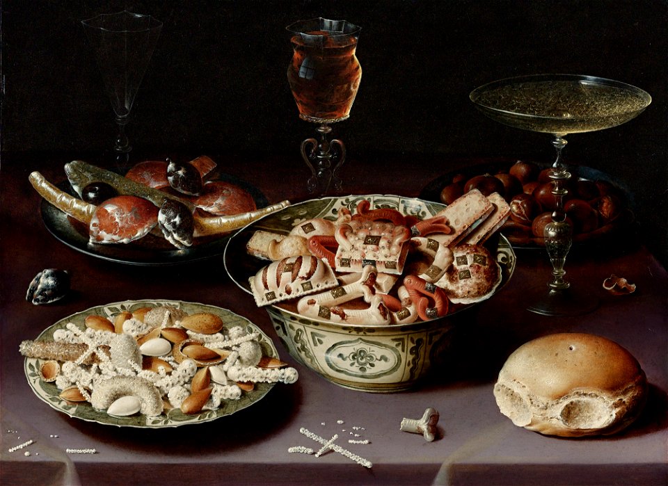 Osias Beert - Still life of porcelain vessels containing sweets, pewter plates bearing sweets and chestnuts, three pieces of glassware and a bread roll on a table draped with a mauve cloth