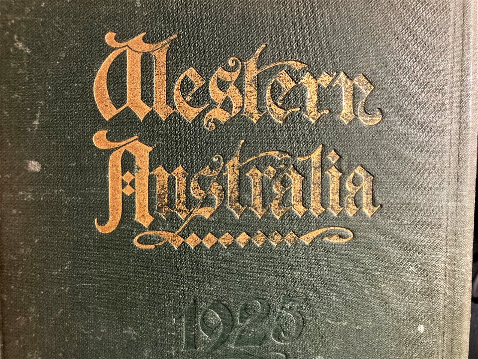 Part of worn cover of the 1925 edition of Western Australia an official handbook