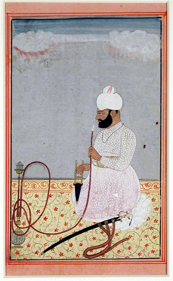 Raja Jagat Prakash of Nirmur smokes a hookah (6124591153)