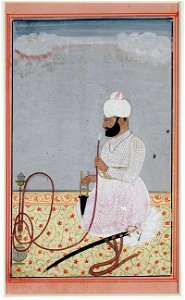 Raja Jagat Prakash of Nirmur smokes a hookah (6124591153)