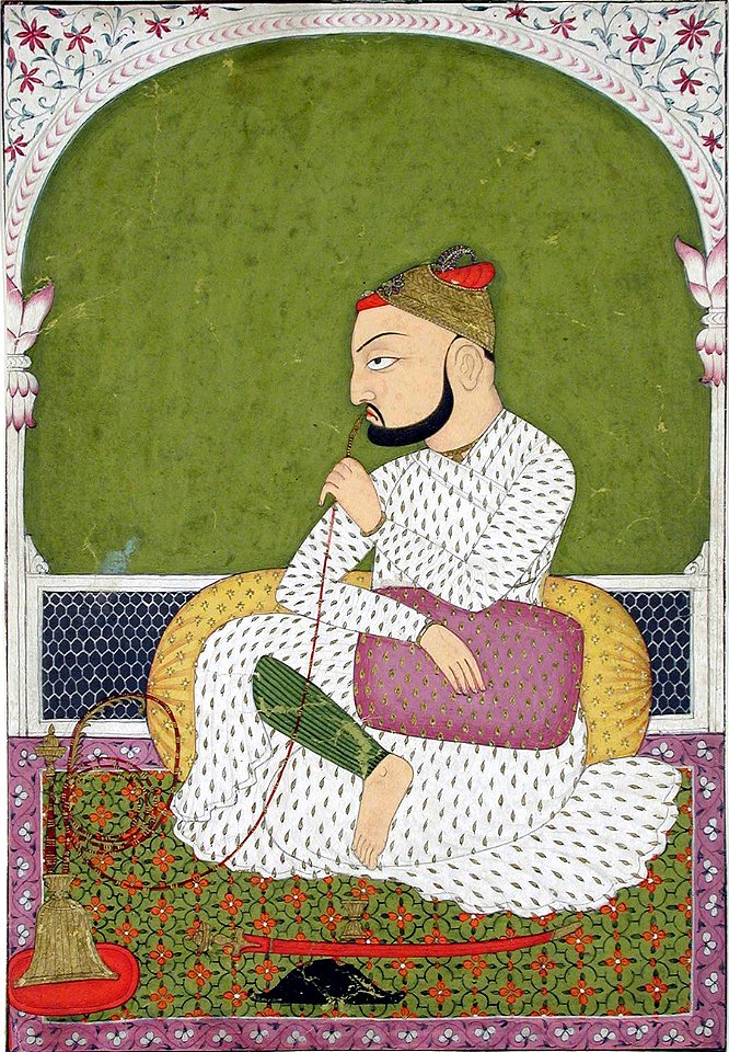 Raja Umed Singh smokes his hookah (6125129130)