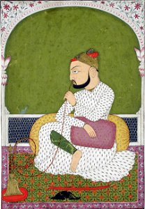 Raja Umed Singh smokes his hookah (6125129130)