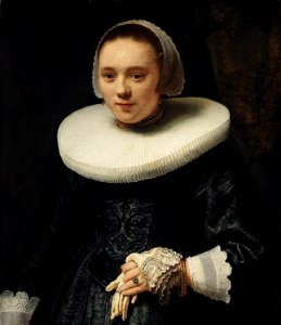 Rembrandt van Rijn - Portrait of a Lady Holding a Glove (1630s). Free illustration for personal and commercial use.