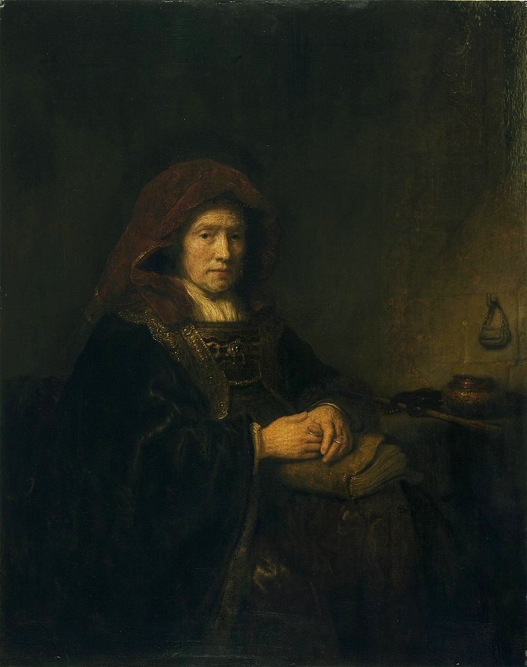 Rembrandt - Portrait of a seated woman with a book and spectacles