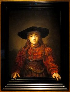 Rembrandt Girl in a Picture Frame (1). Free illustration for personal and commercial use.