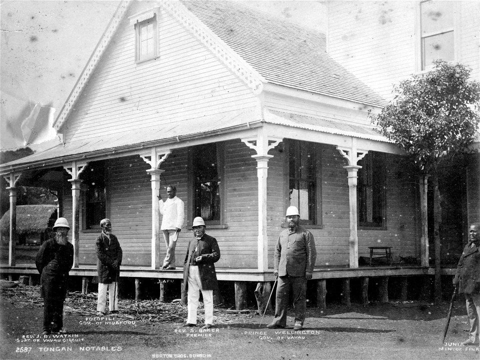 Rev James B Watkin, Fotofili, J Afu, Rev Shirley Waldemar Baker, Prince Wellington and Junia standing outside a house in Neiafu, Tonga