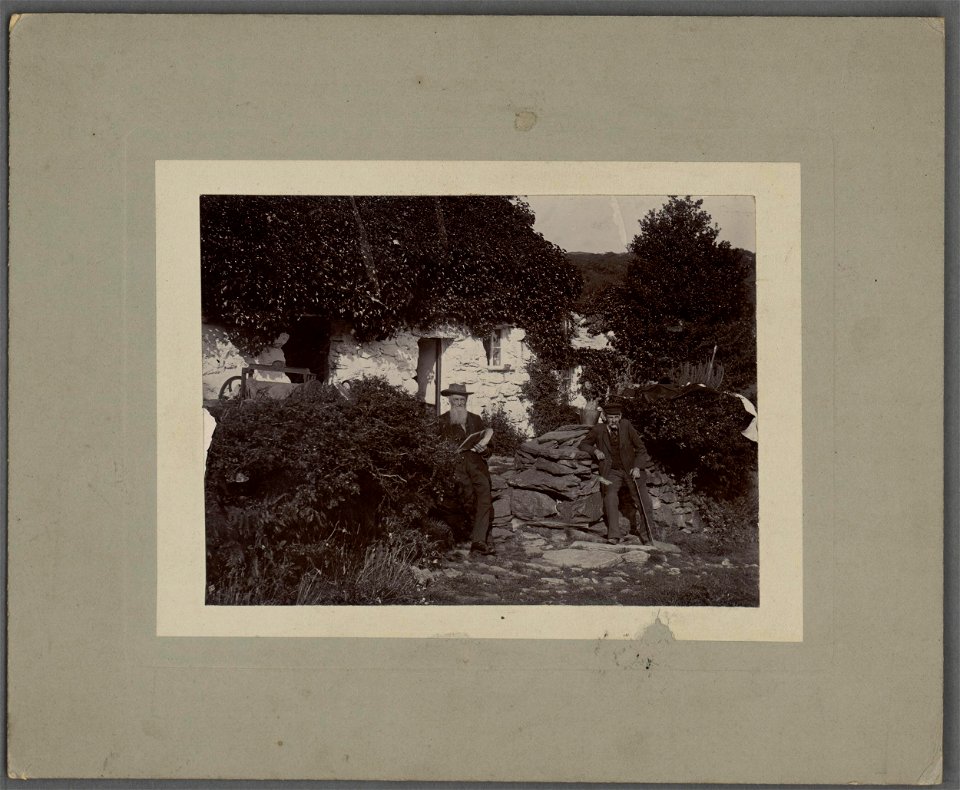 Richard Jones Owen, 'Glaslyn', with a colleague, outside his cottage near Aberglaslyn Bridge, Gwynedd (5292134)
