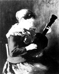 Rippl Woman Playing the Guitar