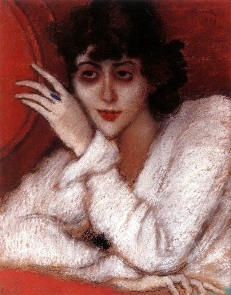 Rippl Zorka in a Red Armchair
