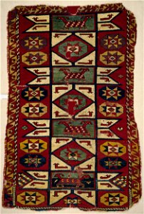 Rug with Star Motifs and Animals - Google Art Project. Free illustration for personal and commercial use.