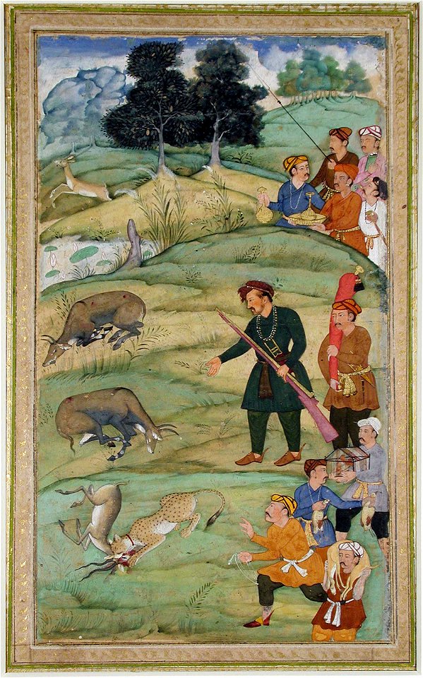 Salim, holding his rifle, gestures at a dead nilgai (6124533009)