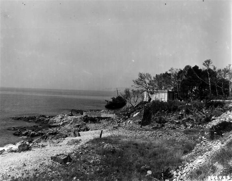 SC 246993 Southern France Invasion, August 1944. USS LST-282 lies burned out and sunk off Cape Dramont, on August 18, 1944