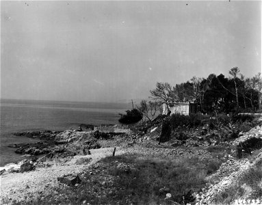SC 246993 Southern France Invasion, August 1944. USS LST-282 lies burned out and sunk off Cape Dramont, on August 18, 1944